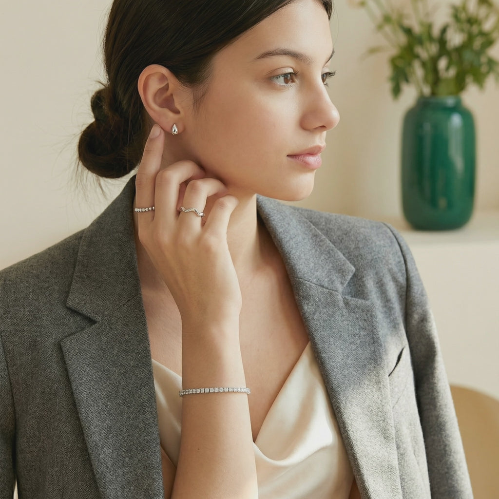 Celestine — Teardrop Silver Studs